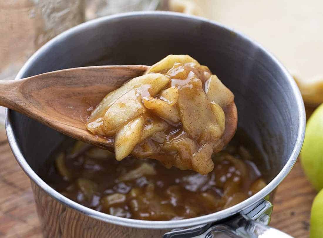 Spoonful of Apple Pie Filling in Pan