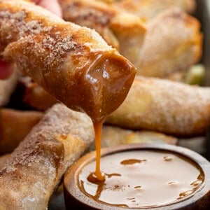 Apple Pie Egg Roll Dipped into Caramel Sauce. Dessert Egg Rolls, Apple Egg Rolls, Apple Pie Egg Rolls, Easy Apple Pie Recipes, Dessert, Air Fryer Apple Pie Egg Rolls, Oven Apple Pie Egg Rolls, Super Bowl Desserts, Thanksgiving Desserts, Christmas Desserts, Snacks, i am baker, iambaker