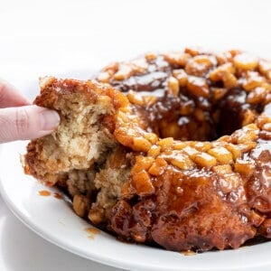 Hand Picking up Piece of Banana Monkey Bread. Breakfast, Monkey Bread, Baking, Breakfast Bread, Morning, Breakfast Recipes, Monkey Bread with Bananas, Bananas Foster Monkey Bread, Bread Bombs, i am baker, iambaker