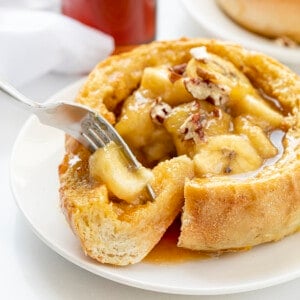 Fork Taking a Bite out of Bananas Foster French Toast Bowl. Breakfast, Breakfast Bowl, French Toast, French Toast Bread Bowl, Bananas Foster French Toast Bread Bowl, Air Fryer Breakfast, Breakfast Recipes, Brunch Recipes, Easy Bananas Foster, French Toast Bowls, i am baker, iambaker.