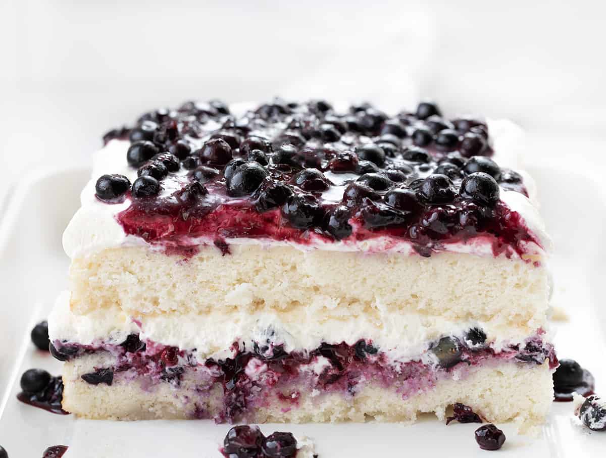 Cut Into Sheet Pan Blueberry Shortcake Cake Showing Tender Layers.