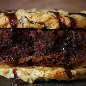 Crownie Sandwich~ Decadent Chocolate Brownie sandwiched between two Chocolate Chip Cookies and Covered in Hot Fudge Sauce