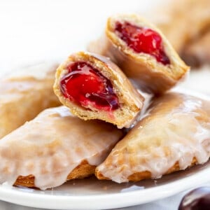 Broke in Half Cherry Hand Pies. Dessert, Snack, Hand Pies, Fried Pies, Fried Hand Pies, Cherry Pies, Air Fryer Cherry Hand Pies, Fried Cherry Hand Pies, Oven Cherry Hand Pies, Cherry Desserts, Baking, Cherry Recipes, Christmas Recipes, Summer Desserts, i am baker, iambaker