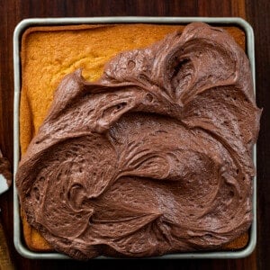 Partially frosted yellow cake using Chocolate Ermine Frosting.