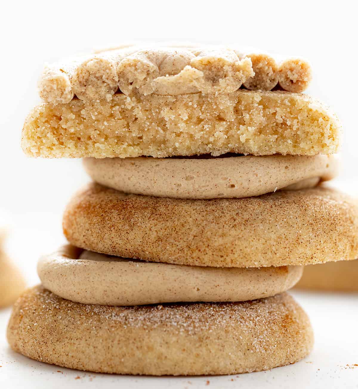 Stacked Churro Cookies with One Broken on Top