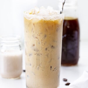 Chocolate Cream Cold Brew Right After Being Stirred with Cold Brew and Cream in Background. Cold Brew, Chocolate Cold Brew, Chocolate Cream Cold Brew, How to Make Cold Brew, Easy Cold Brew, How Do You Serve Cold Brew, Sweet Cold Brew, Drinks, Coffee Drinks, Starbucks Copycat Cold Brew, iambaker, i am baker.