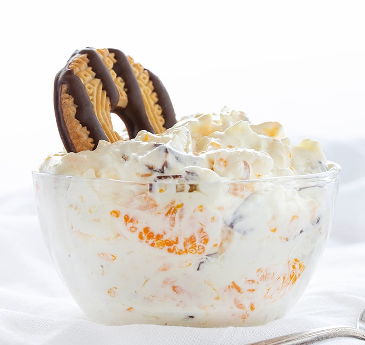 Bowl of Cookie Salad with Fudge Striped Cookie on Top.