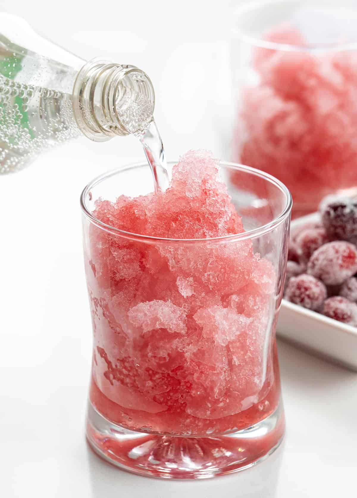 Adding Sprite to Glass of Cranberry Slush