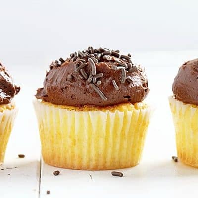 The Perfect Yellow Cupcake with a delicious Whipped Chocolate Buttercream! iambaker.net