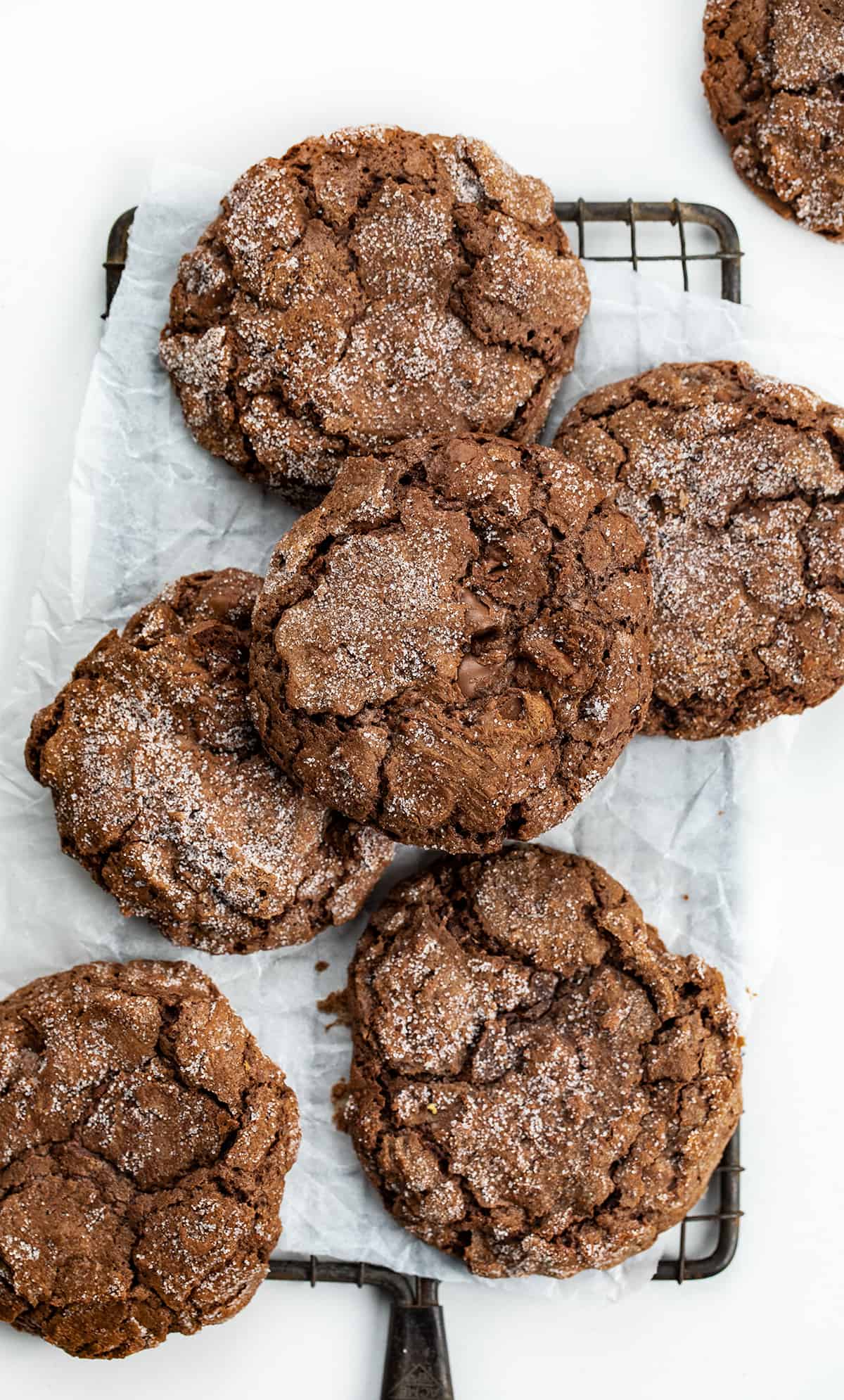 Dirty Chocolate Cookies Stacked on a Cooling Rack.