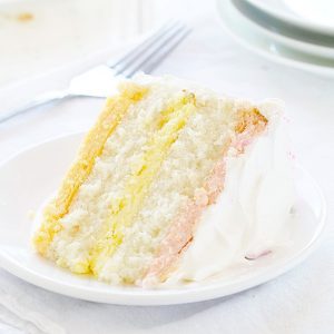 Spring Cake! Raspberry, Lemon and Orange Cheesecake in a Moist White Cake!