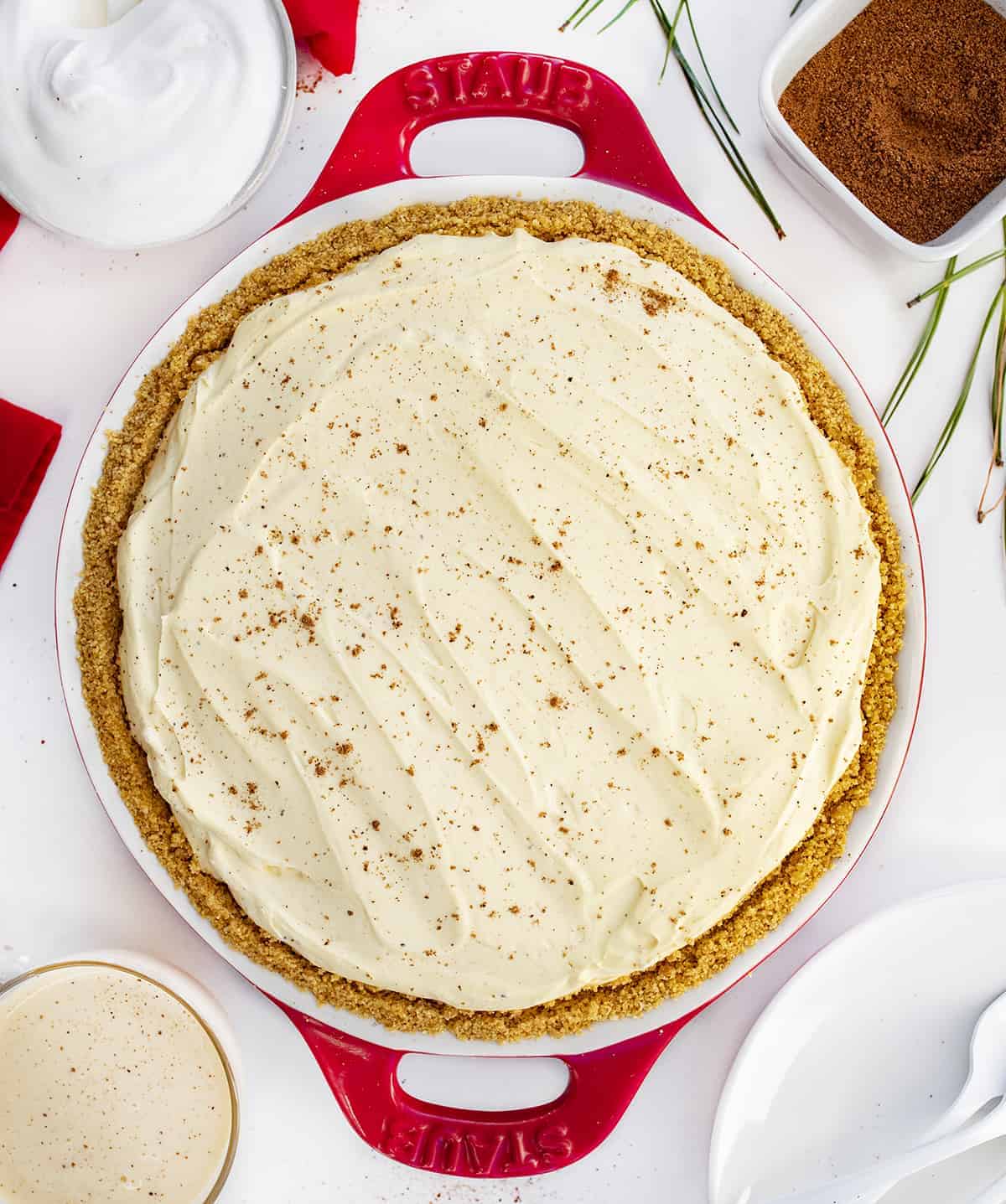 Whole Eggnog Pie in Red Pie Dish