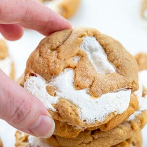 Hand Picking up a Fluffernutter Cookie. Baking, Cookies, Cookie Recipes, Peanut Butter Cookies, Peanut Butter Marshmallow Cookies, Marshmallow Fluff, Cookie Exchange, Dessert, Easy Cookies, i am baker, iambaker