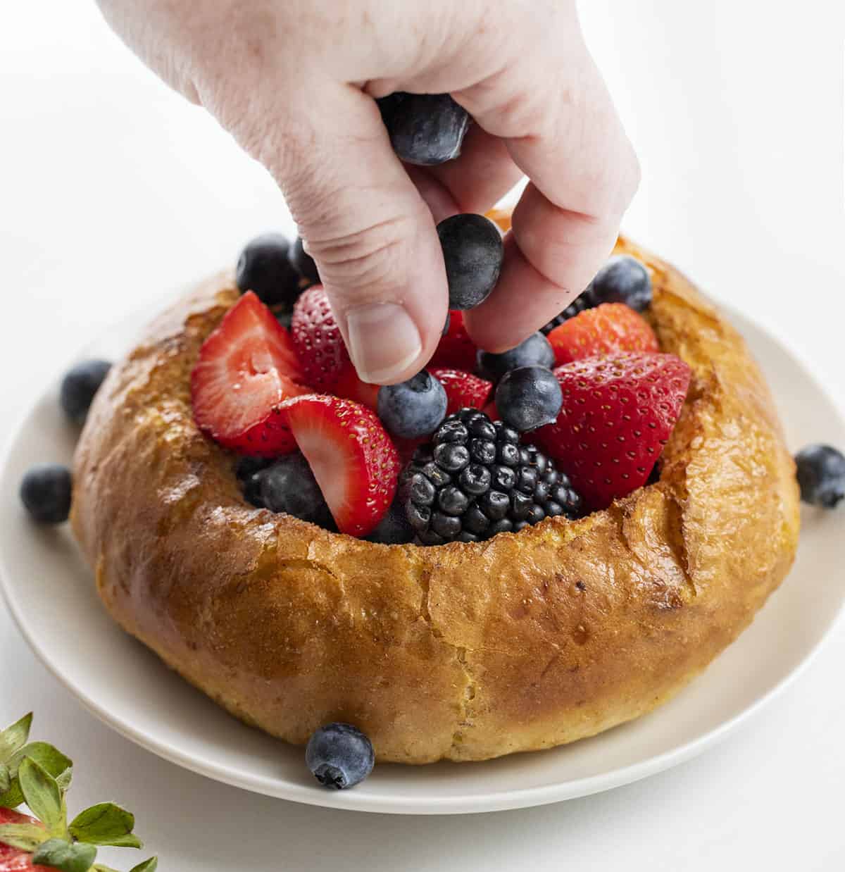 Adding Fruit to Cooked French Toast Bread Bowl. reakfast, French Toast, French Toast Bread Bowl, Fresh Fruit French Toast Bread Bowl, How to Make a Bread Bowl into French Toast, What Bread for French Toast, Fruit Filled French Toast, Fruit Breakfast, Breakfast Recipes, Decadent Breakfast, Brunch Breakfast Ideas, i am baker, iambaker.