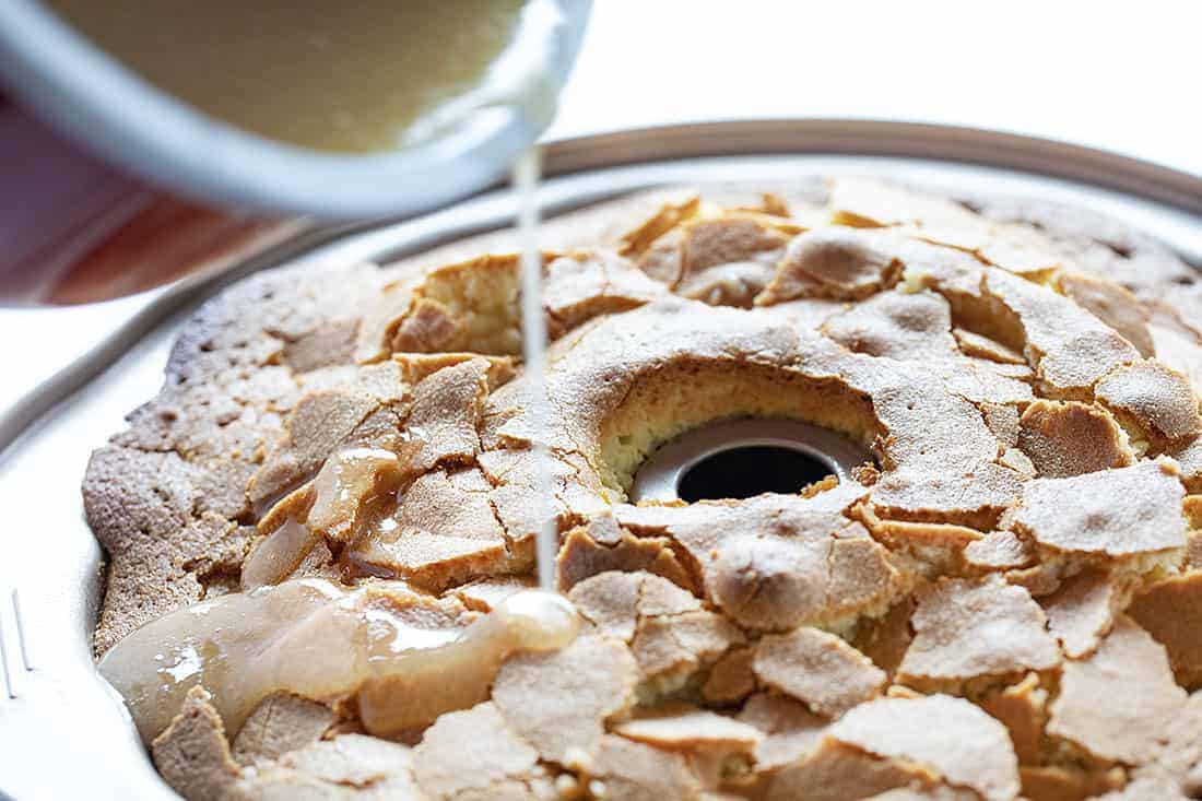 Pouring Butter Glaze over Kentucky Butter Crunch Cake