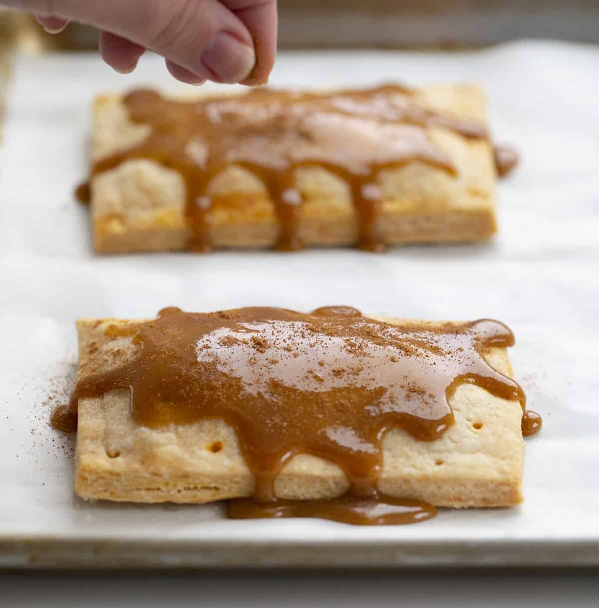 Sprinklingpumpkin Spice on Pumpkin Pie Pop Tarts After Glazing. Breakfast, Pumpkin Dessert, Pumpkin Recipes, Baking, How to Make Pop Tarts, Breakfast Recipe Ideas, Dessert, Snacks, Treats, Fall Treats, Fall Baking Recipes, i am baker, iambaker