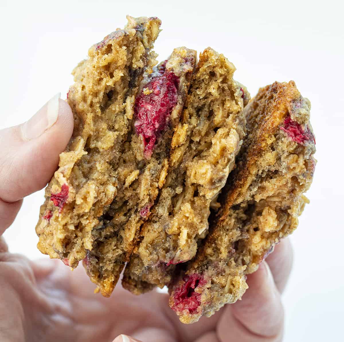 Hand Holding Broken in Half Raspberry Oatmeal Cookies Showing Inside Texture. Cookies, Baking, Raspberry Cookies, Raspberry Oatmeal Cookies, Cookie Recipes, Cookie Exchange, Fruit Cookies, Summer Baking, Healthier Cookie Recipes, Dessert, i am baker, iambaker