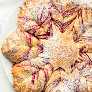 Close up of Cranberry Orange Star Bread. Dessert, Baking, Holiday Baking, Star Bread, Christmas Dessert, Christmas Bread, Thanksgiving Bread, Thanksgiving Bread, New Years Eve Dessert, Holiday Recipes, Entertaining Recipes, i am baker, iambaker